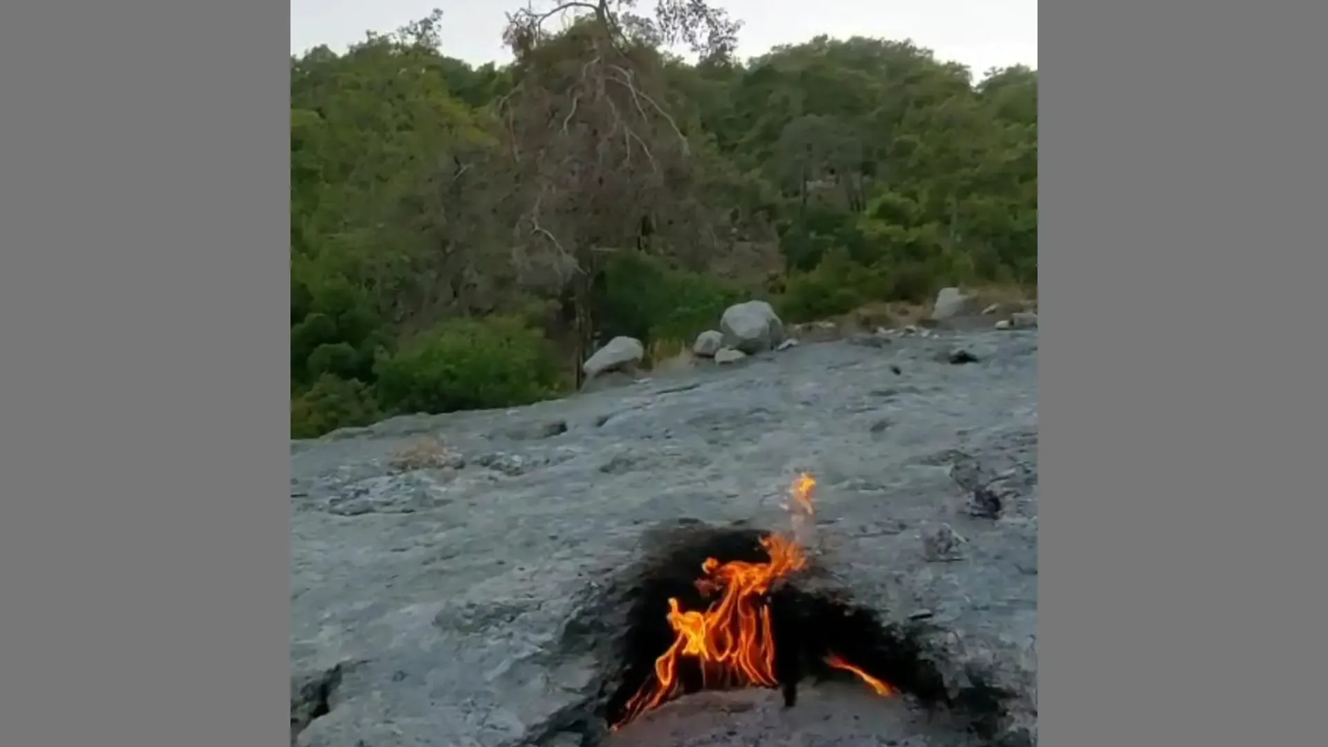 Natural flames burning continuously on the rocky slopes of Mount Chimera