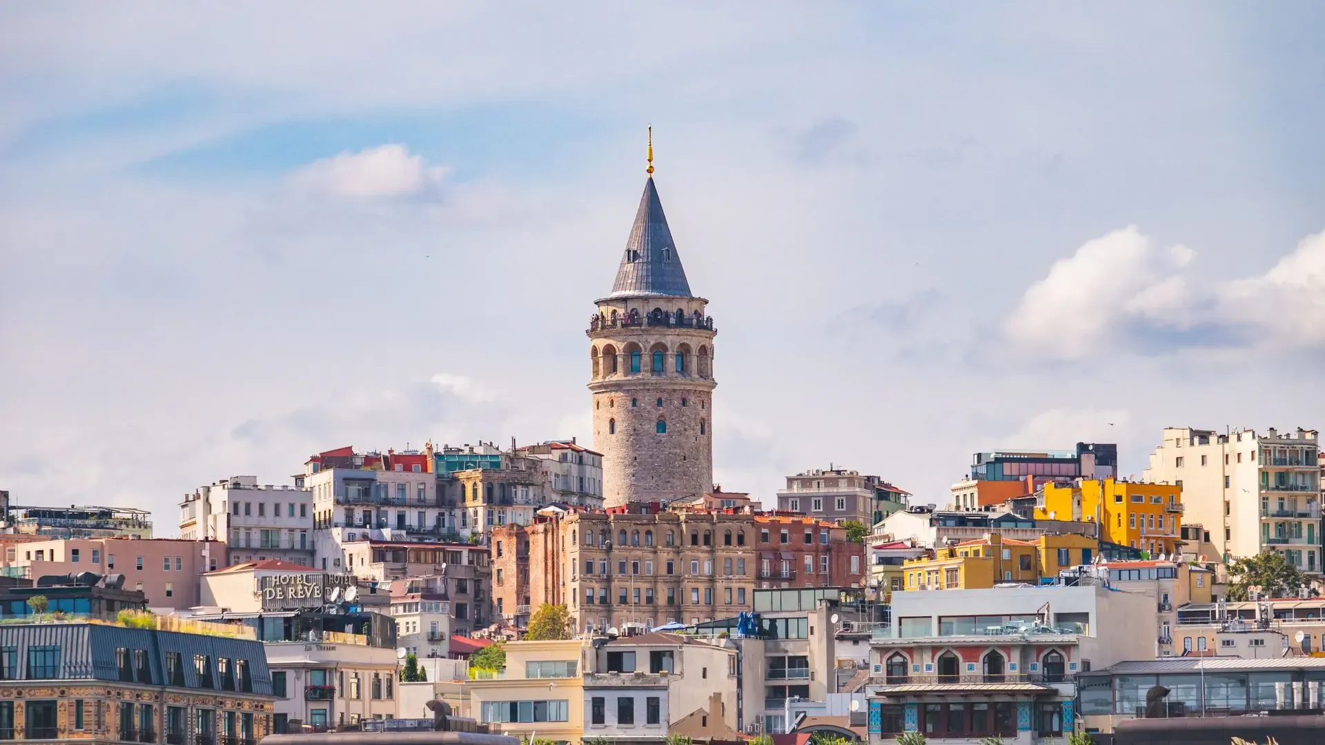 The medieval stone Galata Tower standing tall against the Istanbul skyline