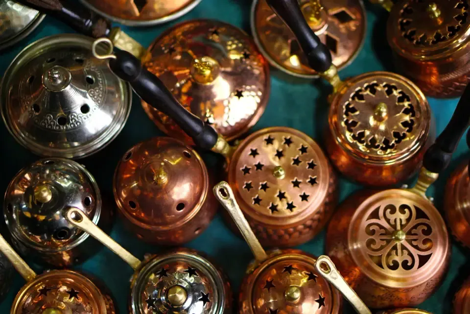 Traditional engraved copper cup used to make Turkish coffee