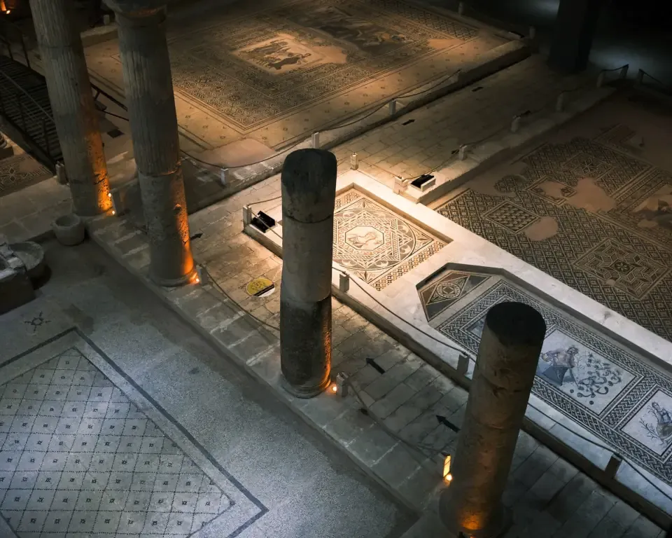 Intricate Roman floor mosaics depicting mythological figures