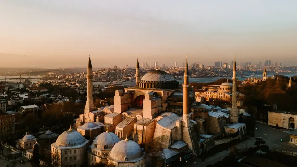 The historic skyline of Istanbul featuring Hagia Sophia at sunset