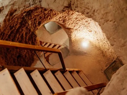 Stairs descending into the depths of the underground city in Cappadocia.