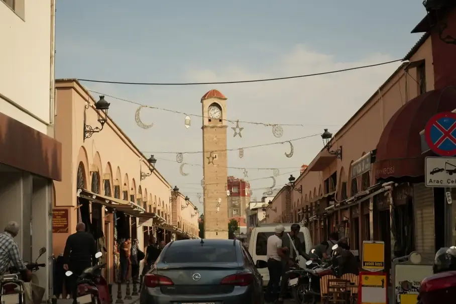 The Great Clock Tower over the brick arches of Kazancilar Bazaar in Adana
