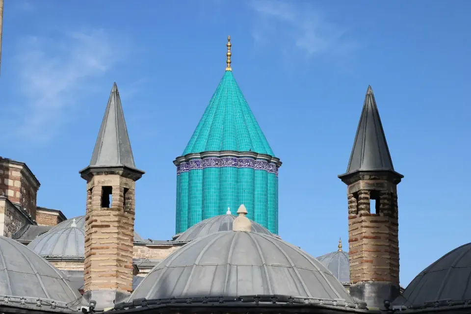 The iconic green tiled conical dome of the Mevlana Mausoleum in Konya